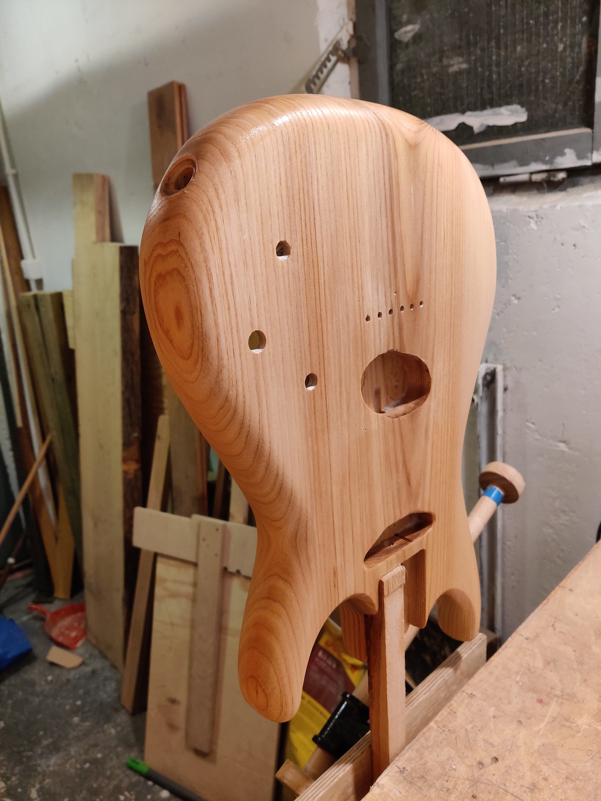 Guitar body with varnish drying on it