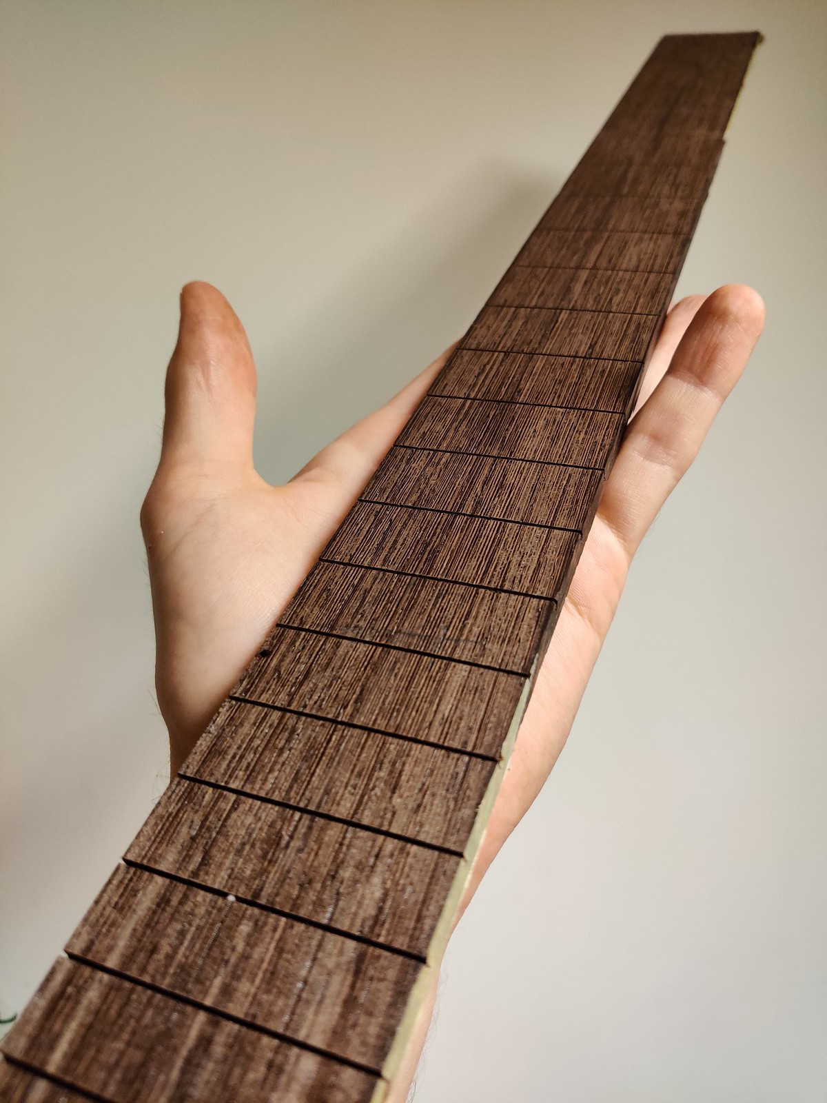 Fretboard blank with slots cut