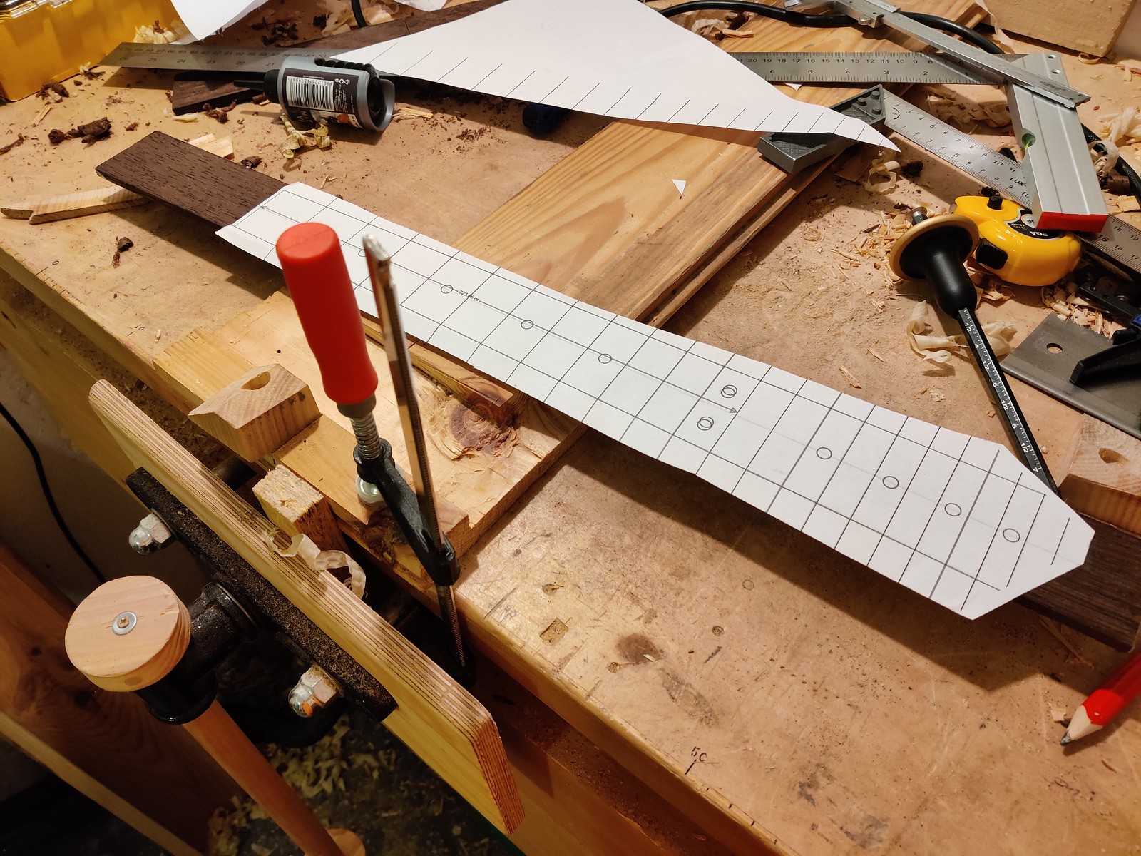 Fretboard blank with a template on it