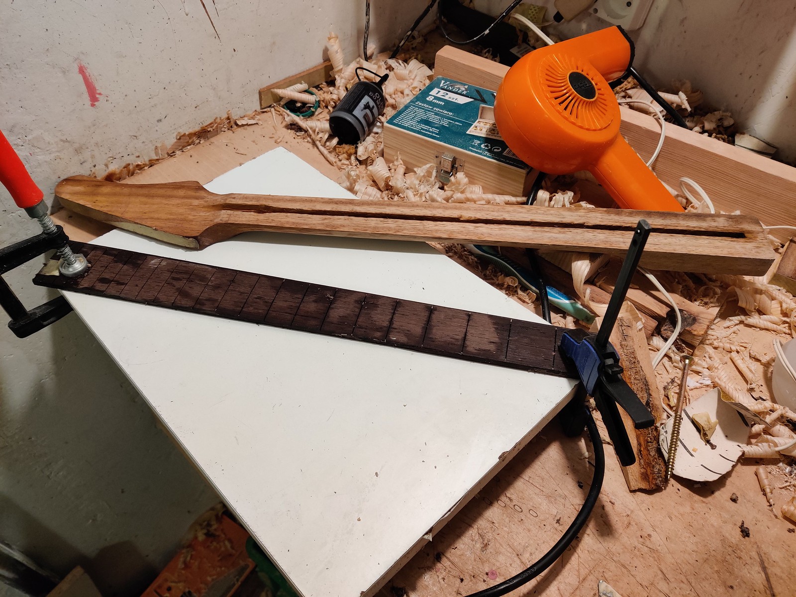 Guitar fretboard unglued from the neck